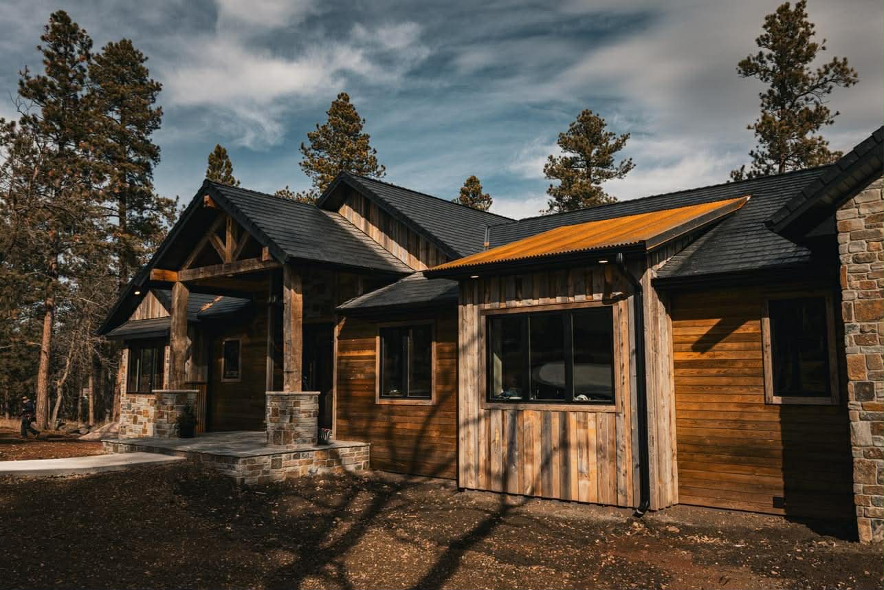 Roofing materials including slate, clay tiles, asphalt shingles, and metal panels