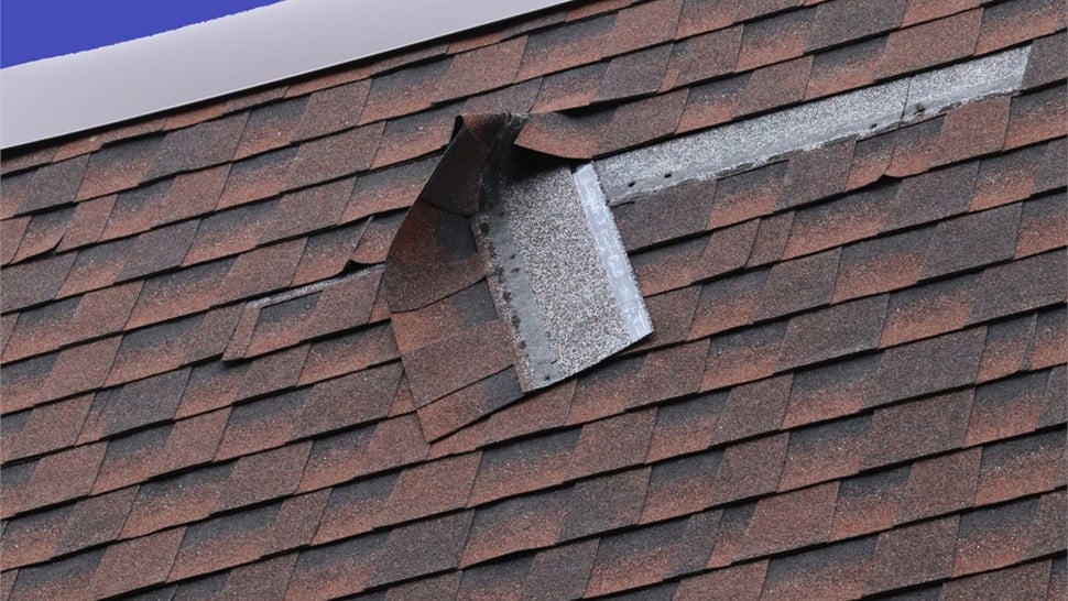 Roofing repair project in Kingston, NY - Before and after